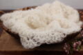 Off-white newborn alpaca mohair wrap photography prop.