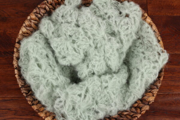 Light mint green newborn alpaca mohair wrap photography prop.