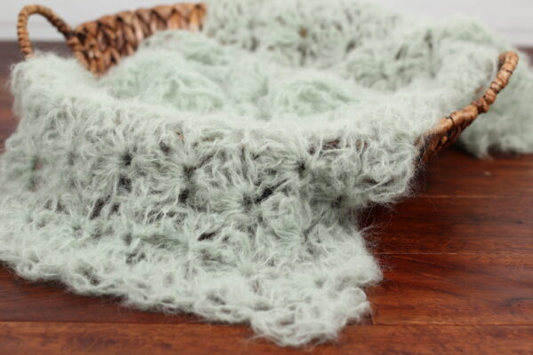 Light mint green newborn alpaca mohair wrap photography prop.